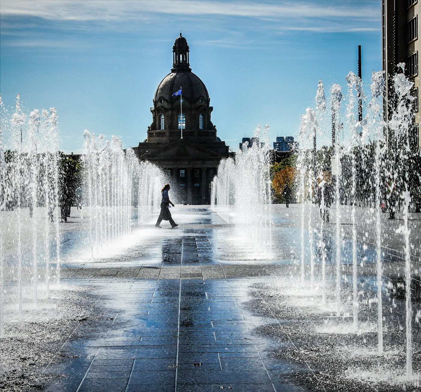 The Alberta Legislature dome behind the plaza fountains in Edmonton